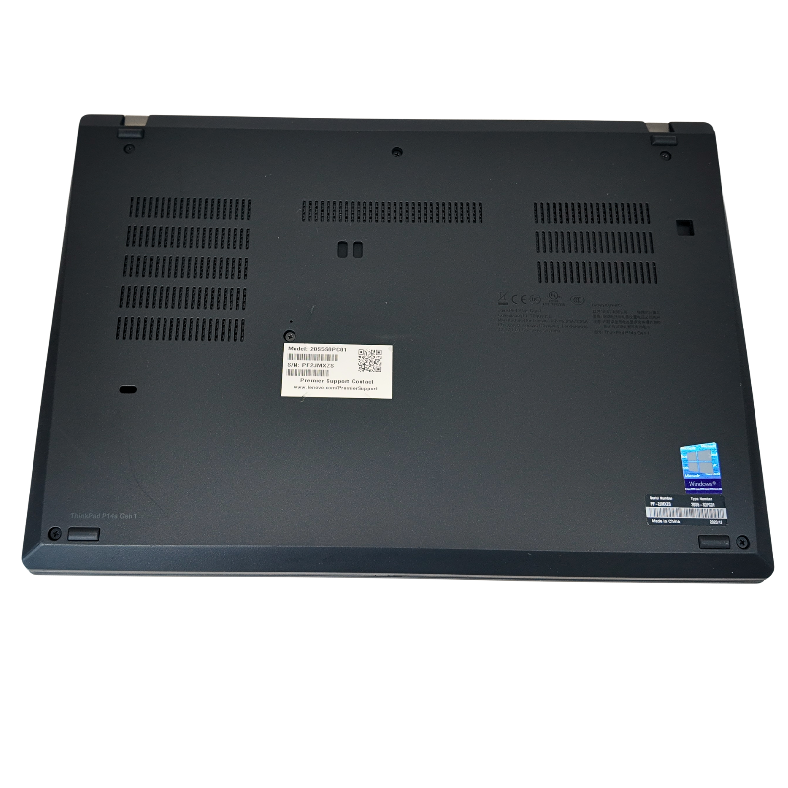 Back view of a black laptop with ventilation slots on a white background