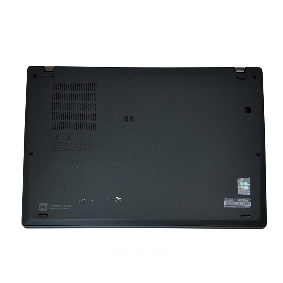 Back cover of a black Lenovo ThinkPad T14s Gen 2 laptop, open to show the 14-inch screen, backlit keyboard with a red TrackPoint, and slim chassis.